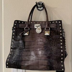 Michael Kors shoulder bag with long strap.